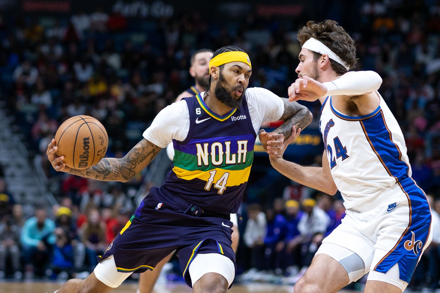  Jan 28, 2023 New Orleans, Louisiana, USA  New Orleans Pelicans forward Brandon Ingram (14) dribbles against Washington Wizards forward Corey Kispert (24) during the first half at Smoothie King Center. Mandatory Credit Stephen Lew USA TODAY Sports